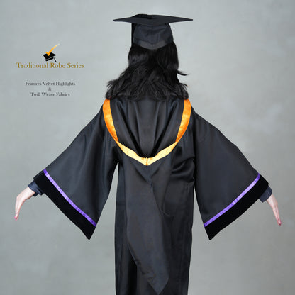 A person wearing a black bachelor graduation gown from the back with a snap-on hood design, velvet highlights, and a mortarboard set.