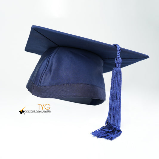 Blue graduation cap with a blue tassel on a white background.