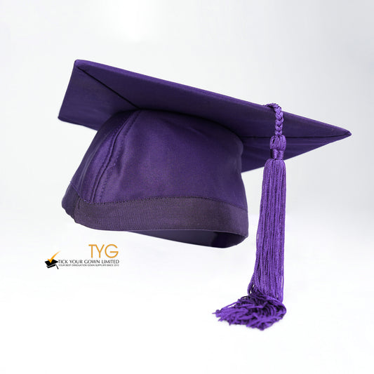 Purple graduation cap with a purple tassel on a white background.