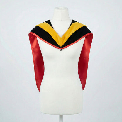Master's graduation hood displayed on a mannequin showing full shape with black velvet body, yellow velvet hood and red satin lining.