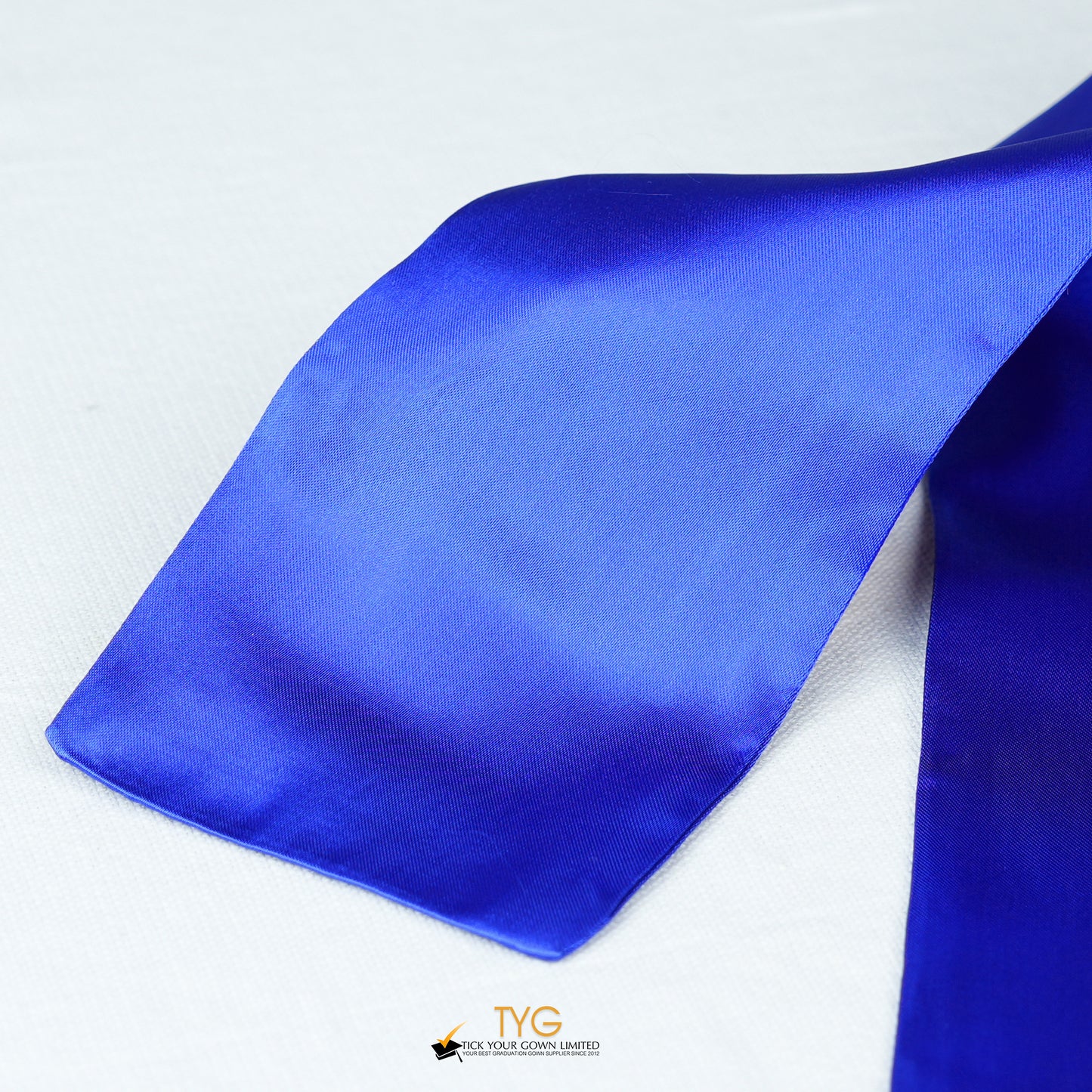 Detailed view of a navy stole fabric on a white background.