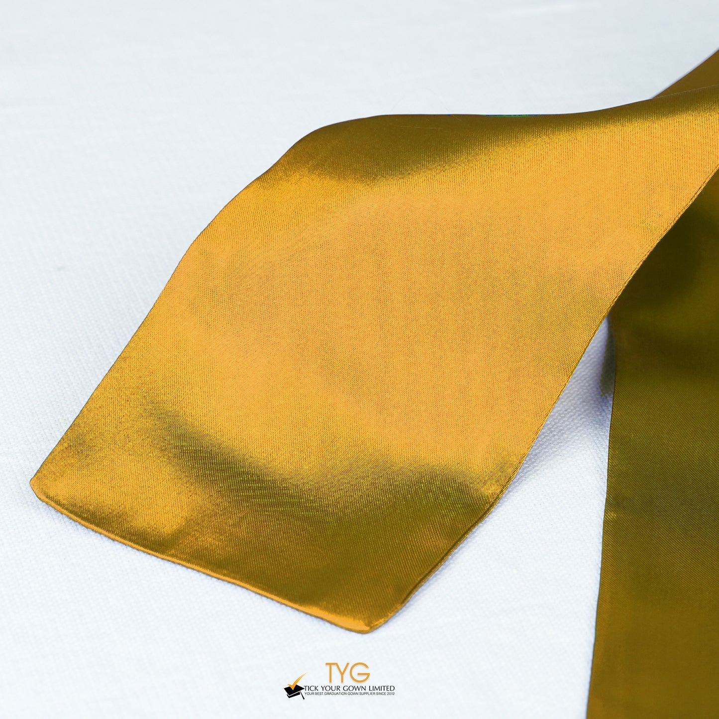 Detailed view of a orange stole fabric on a white background.