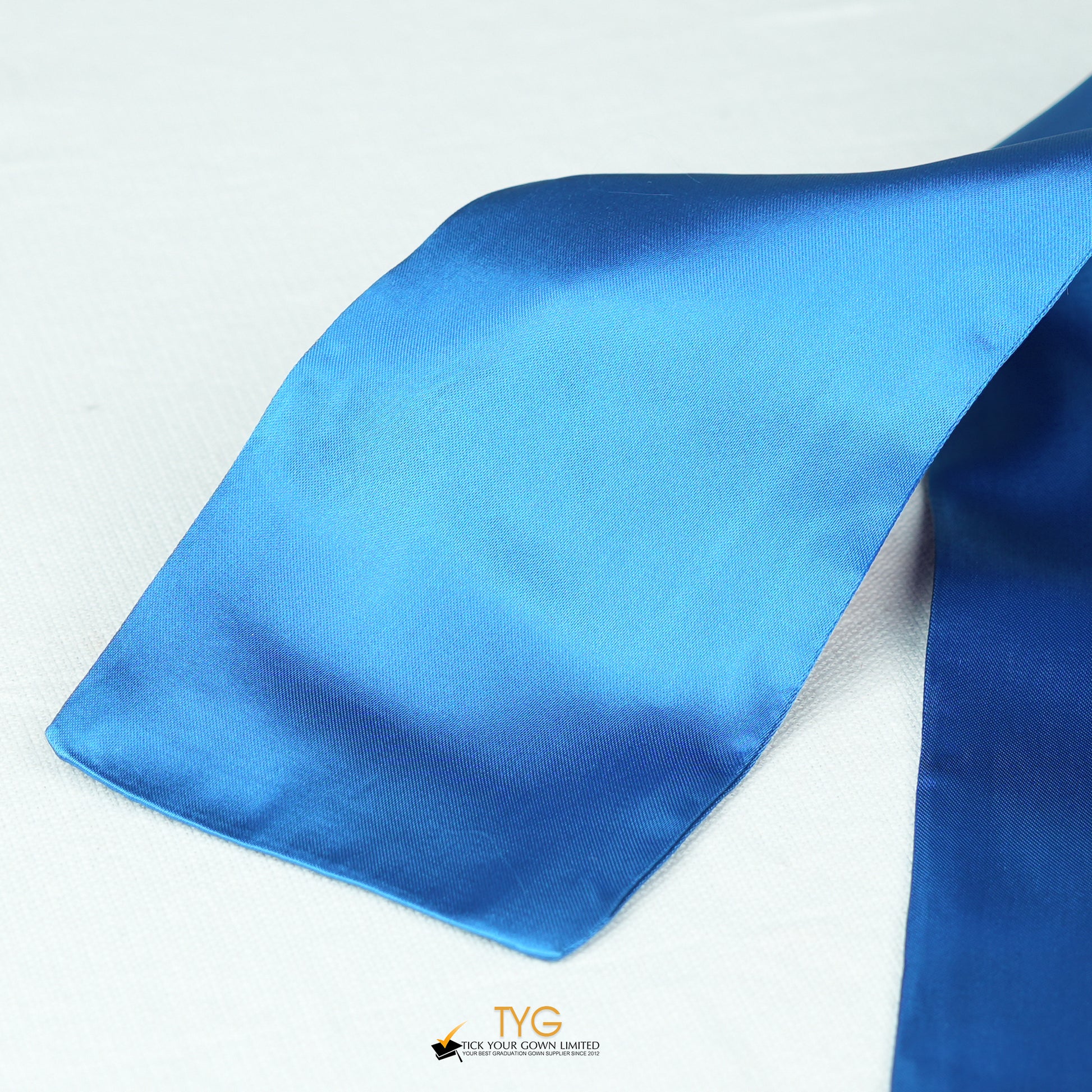 Detailed view of a sky blue stole fabric on a white background.
